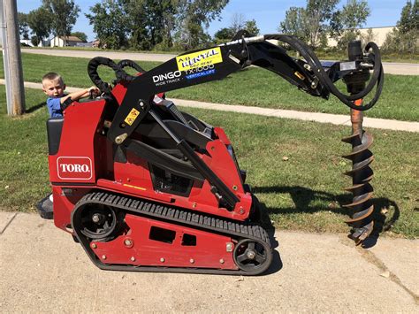 mini excavator with auger rental